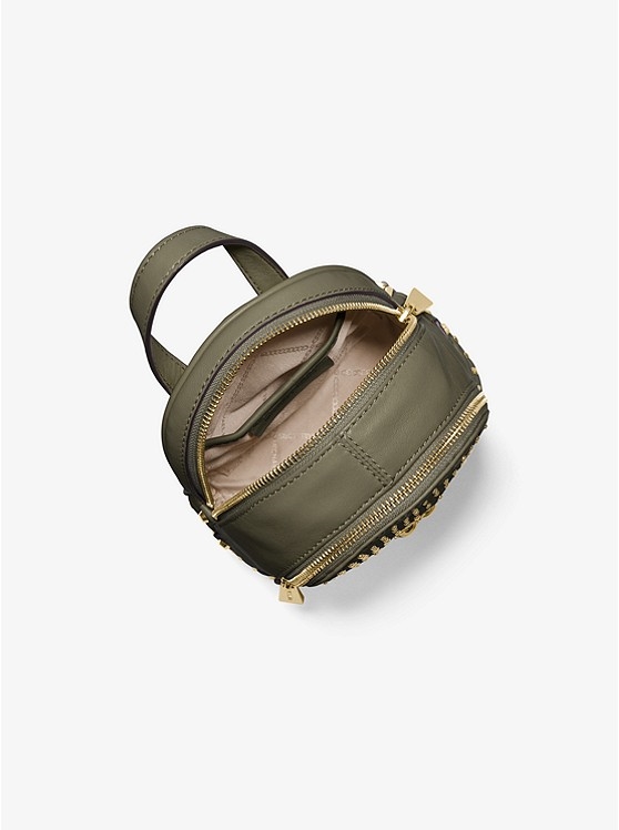 Каталог Rhea маленький кожаный рюкзак с шипами от магазина Michael Kors