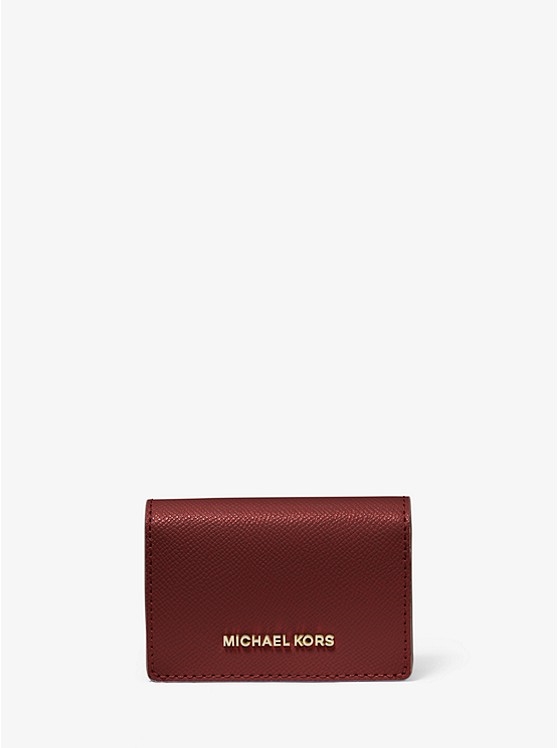 Каталог Небольшой двухцветный кожаный кошелек от магазина Michael Kors
